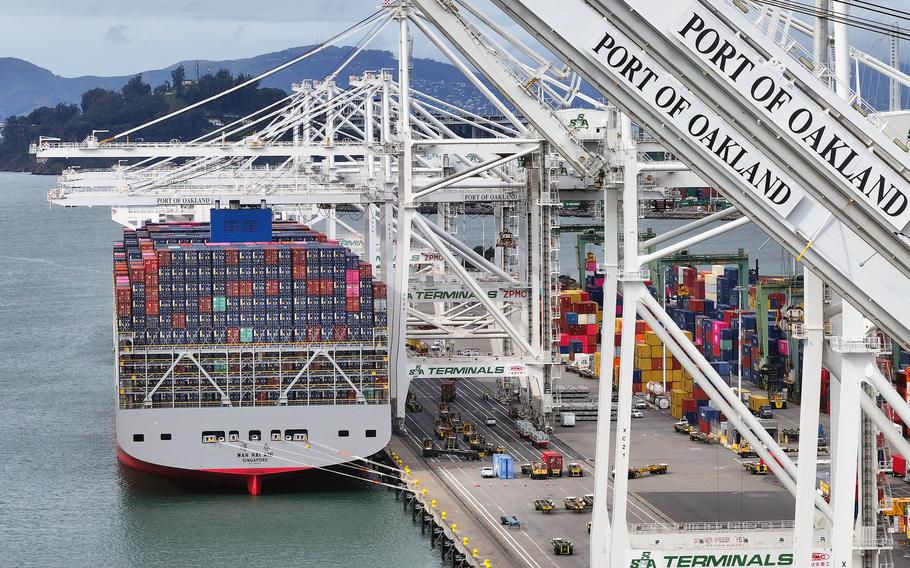 A ship loaded with containers in port.