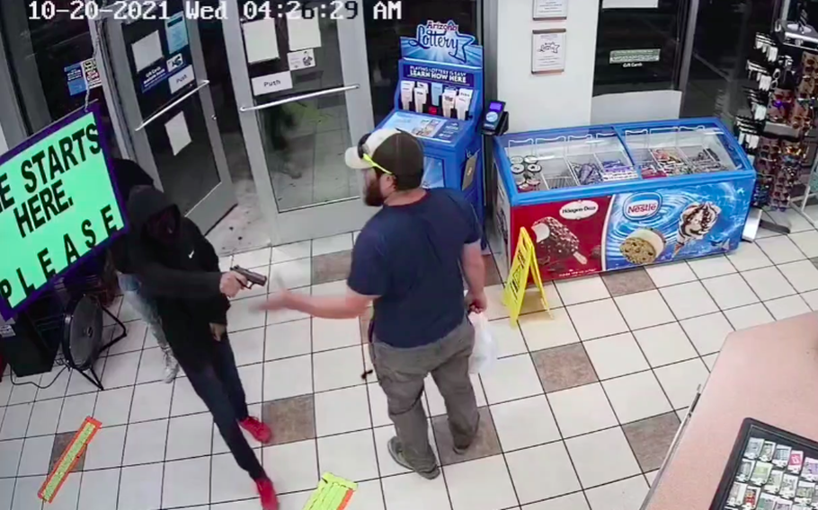 James Kilcer, who claimed to be a Marine Corps veteran, shown Wednesday in surveillance footage disarming a would-be robber at a convenience store in Yuma, Ariz., according to the Yuma County Sheriff’s Office. 