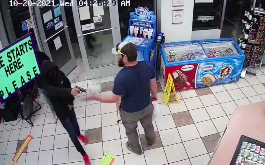 James Kilcer, who claimed to be a Marine Corps veteran, shown Wednesday in surveillance footage disarming a would-be robber at a convenience store in Yuma, Ariz., according to the Yuma County Sheriff’s Office. 