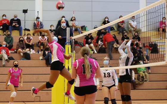 Vilseck's Meaalofa Crawford, center, prepares to slam the ball during a volleyball match against Hohenfels at Vilseck, Germany, Saturday, Oct. 9, 2021.

Immanuel Johnson/Stars and Stripes