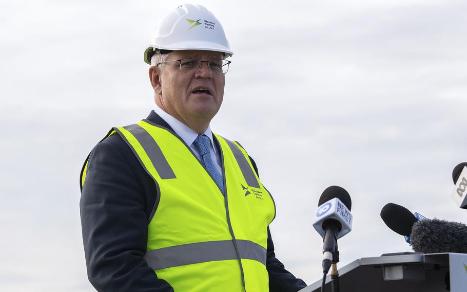 Australian Prime Minister Scott Morrison visits a new airport site in Sydney, Monday, March 28, 2022.