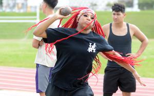 Senior Sharday Baker is already noticeable because of her red braided hair. The Kadena sprinter is also hoping to break some Pacific sprint reccords and gain more notoriety.