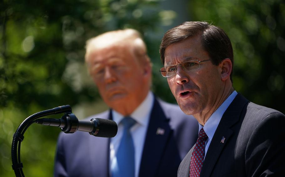 U.S. Defense Secretary Mark Esper, with U.S. President Donald Trump, speaks on vaccine development on May 15, 2020, in the Rose Garden of the White House, in Washington, D.C.