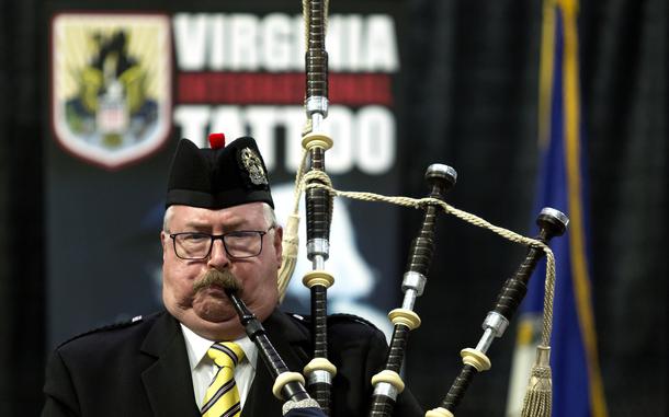 Thom Metz of Virginia Beach playing with other members of the Tidewater Pipes and Drums in February 2024 at Scope in Norfolk. The Virginia Arts Festival was announcing the participating nations for the Virginia International Tattoo that April. (Bill Tiernan / For The Virginian-Pilot)