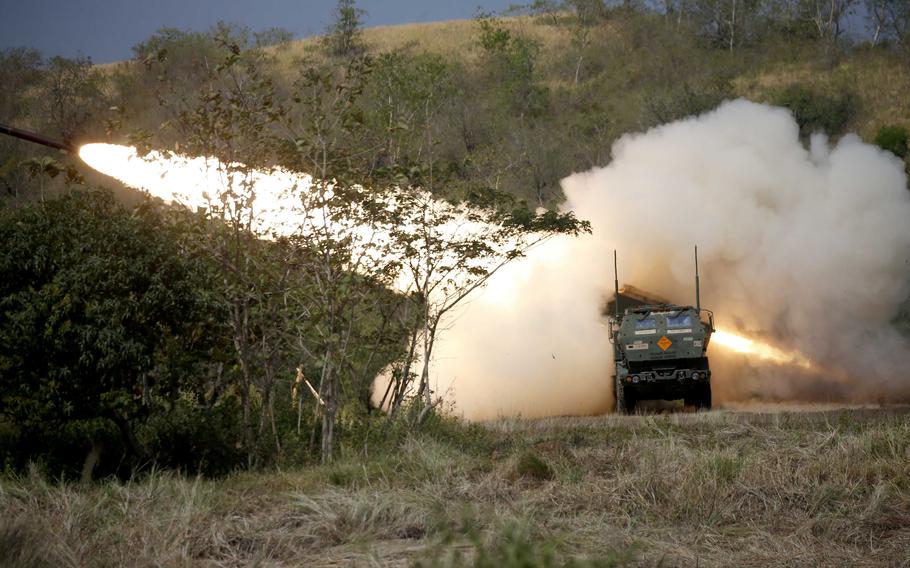 Soldiers fire a U.S. Army High Mobility Artillery Rocket System, or HIMARS, during the annual Salaknib exercise at Fort Magsaysay, Philippines, Friday, March 31, 2023. 