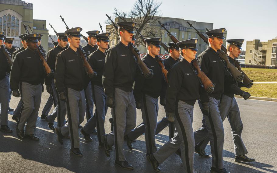 Cadets march at Virginia Military Institute, a college that's in a tense debate over racism, sexism and diversity reforms. One staff member said of Martin Brown: "He made a case as to why he shouldn't have a job."