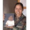 Eagle Base, Bosnia and Herzegovina, May 6, 2002: Sgt. Michelle Flores writes letters often to her son, Emilio. At 14-months, the boy is too young to read them, but some day he'll know his mother was 
thinking of him while she was deployed to Bosnia and Herzegovina.

Happy Mothers' Day to all military moms and a bit of extra love to those deployed and away from their children this Mothers' Day -- as Sgt. Flores was back in 2002. Read how the Sergeant, and other mom's deployed at Eagle Base dealt with the separation here. 

META TAGS: Mothers' Day; military family; women in the military