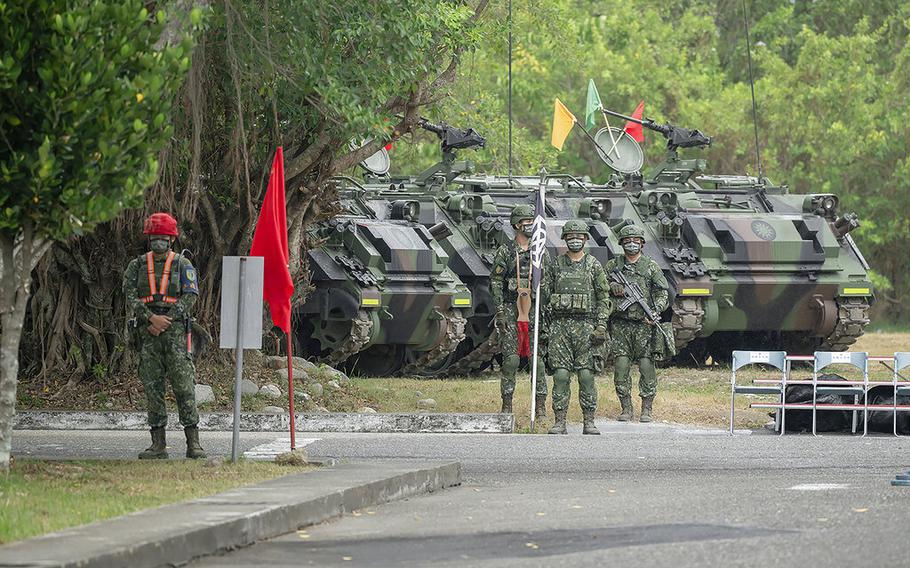 Taiwanese troops drill as Taiwan’s President Tsai Ing-wen visits a camp in Hualien, in eastern Taiwan on Tuesday, Sept. 6, 2022. 