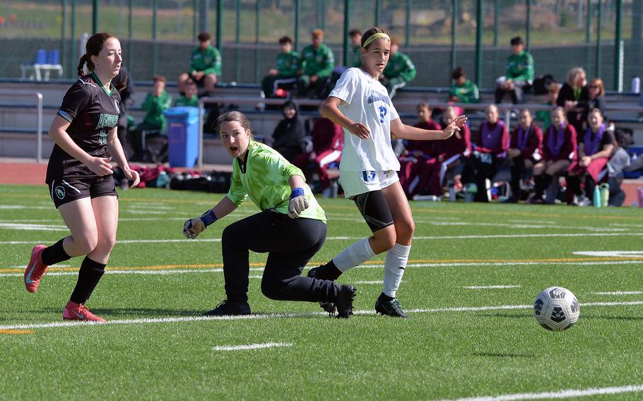 AFNORTH’s Shannon O’Connor and Avery Sweeney and Sigonella’s Madison Hoy watch Hoy’s ball bounce toward, but past the goal in the Lions 4-2 win over the Cougars in the Division III girls final at the DODEA-Europe soccer championships in Ramstein, Germany, May 22, 2025.