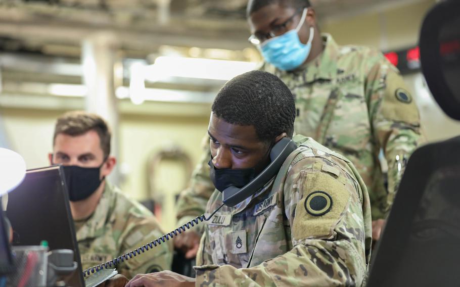 U.S. Army soldiers with I Corps establish communications aboard USNS City of Bismarck as part of a training exercise on Feb. 22, 2022. 