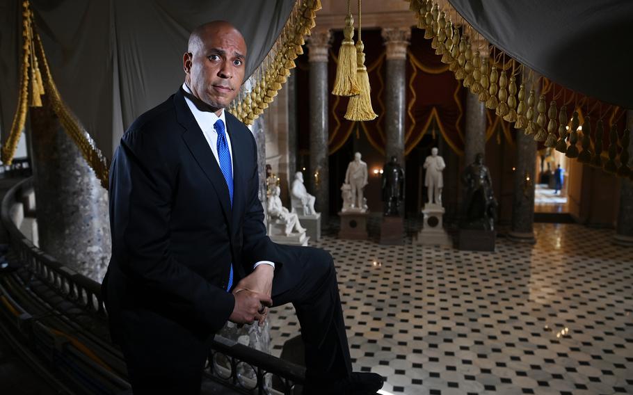 Sen. Cory Booker, D-N.J., seen in the Capitol's Statuary Hall, has fought to have Confederate statues removed from the building. 