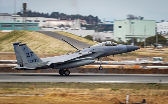An Air Force F-15C Eagle assigned to the 44th Fighter Squadron at Kadena Air Base, Okinawa, lands in Fukuoka, Japan, March 17, 2022.