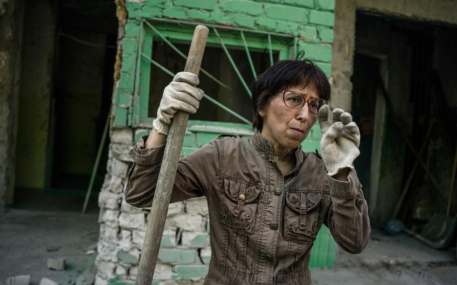 Marina Smelianskaia, seen on May 4, 2022, is a volunteer who has helped clean up areas destroyed in Russian strikes in Kharkiv. 