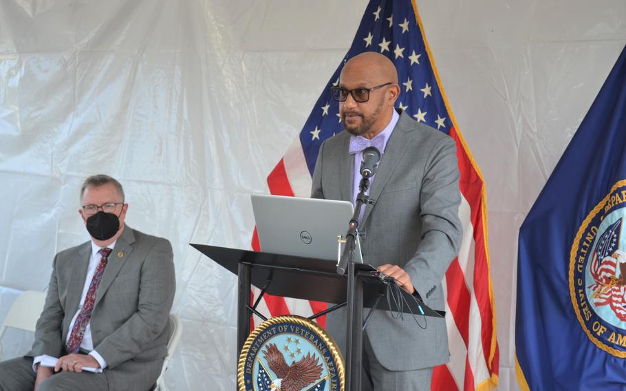 Jason Holt speaks Tuesday during a ceremony at Fort Sam Houston National Cemetery in San Antonio, Texas, about his uncle, Pfc. Thomas Hawkins. The soldier was one of 19 hanged for mutiny after the Houston Riots of 1917 and wrote to his family that he was innocent before his death. The Army this month announced it would review the trials.