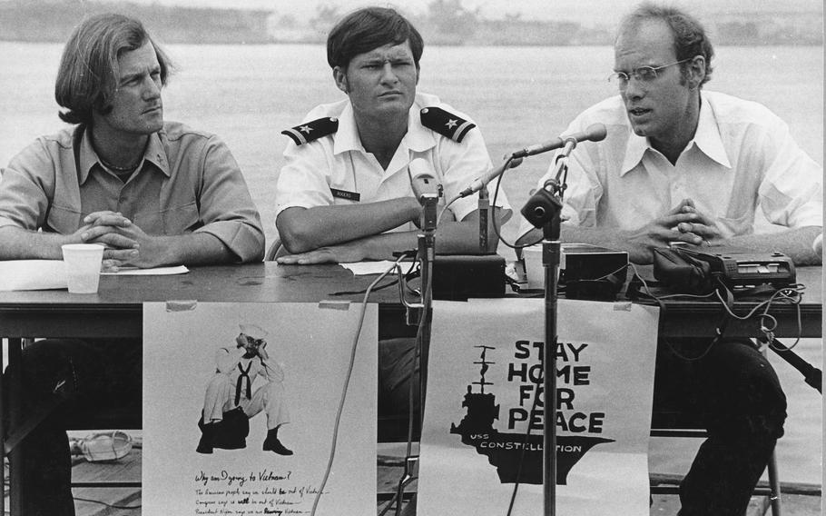 David Harris, right, protests the USS Constellation’s return to the Vietnam War at a press conference in 1971.