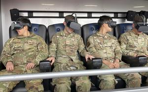 Airmen wear virtual reality goggles during the simulation of a major earthquake at Yokota Air Base, Japan, March 28, 2024.