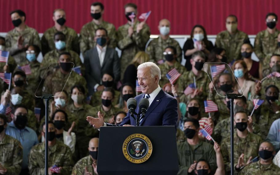 President Joe Biden speaks to American service members at RAF Mildenhall in Suffolk, England, Wednesday, June 9, 2021. 