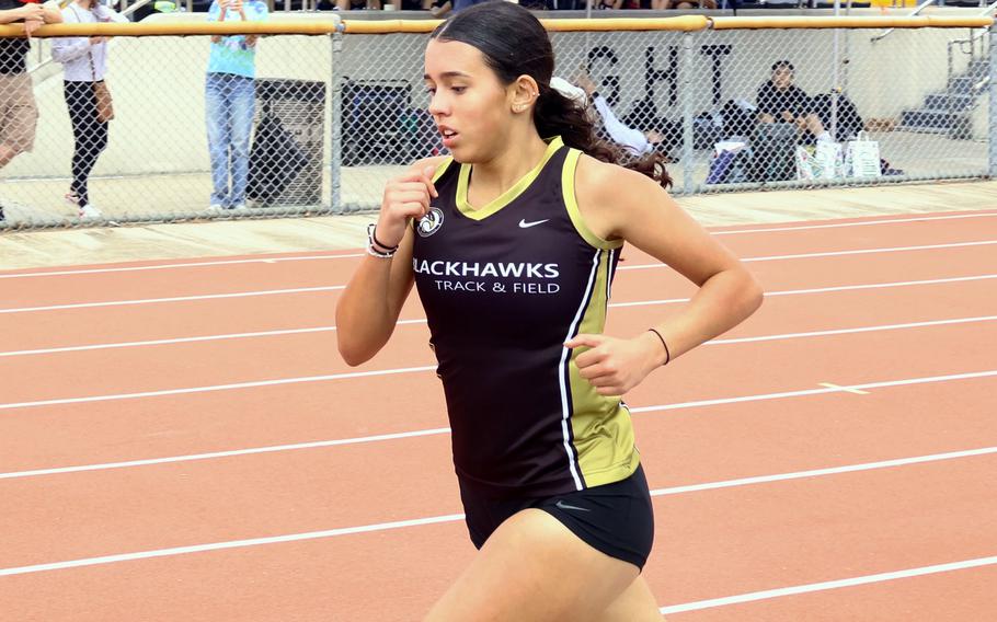 Cassandra Jarzabek runs on the track.