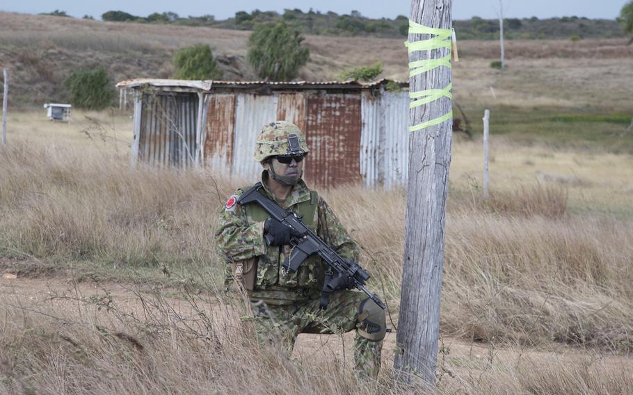 A Japanese soldier takes part in the Talisman Sabre exercise's finale near Stanage Bay, Australia, Wednesday, Aug. 2, 2023. 