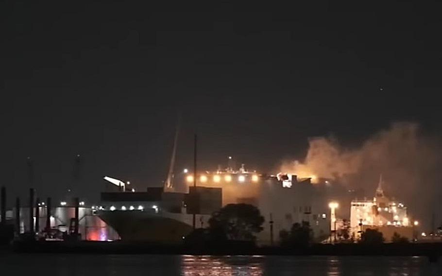 A video screen grab shows smoke rising from a cargo ship docked at Port Newark on Wednesday, July 5, 2023. Two N.J. firefighters were killed while fighting a fire on a ship at the port, according to reports on July 6.