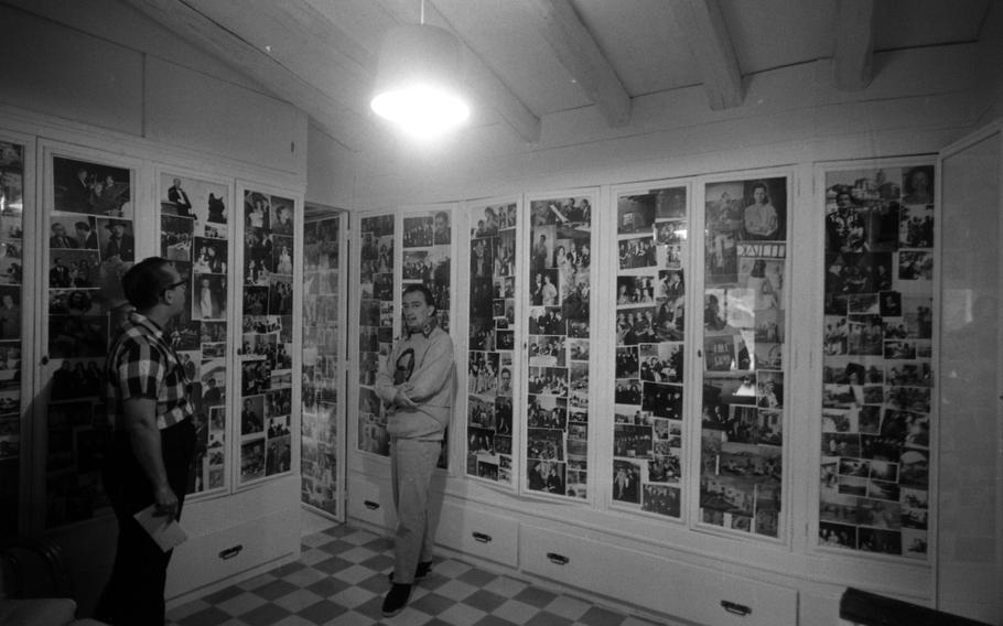 Salvador Dali shows the dressing room adjoining the master bedroom. The room has all four walls covered with photographs of Dali taken with famous people throughout the world. 