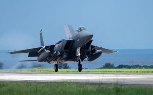 A U.S. Air Force F-15E Strike Eagle, assigned to the 336th Expeditionary Fighter Squadron, Seymour Johnson Air Force Base, N.C., lands at Kadena Air Base, Okinawa, July 1, 2025.