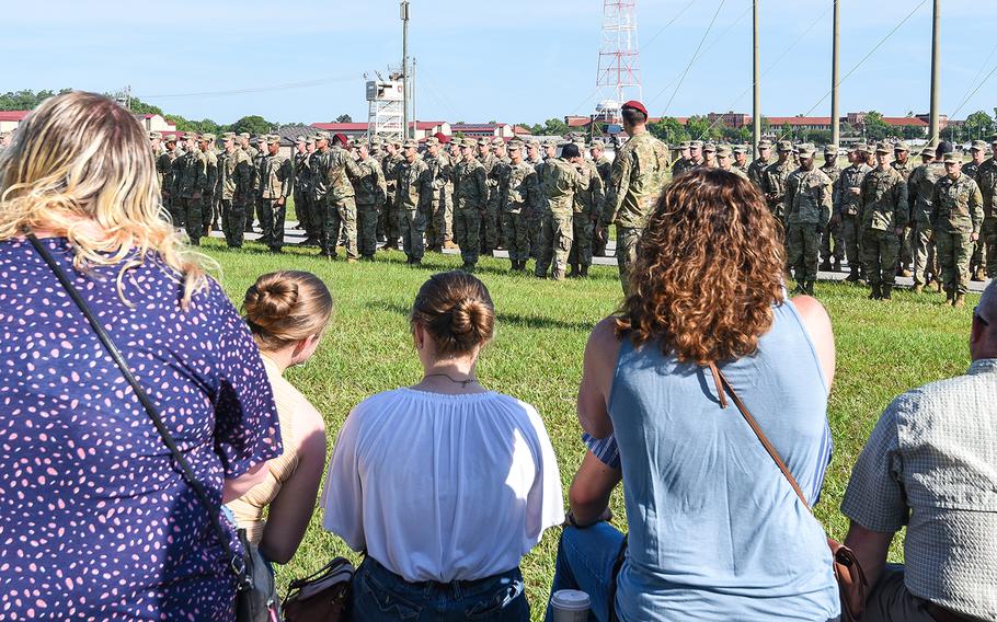 Family members watch their soldiers graduate from the Army’s Basic Airborne Course at Fort Benning, Ga. on Friday, May 21, 2021. It marked the first airborne school graduation open to family and loved ones since the beginning of the coronavirus pandemic. 