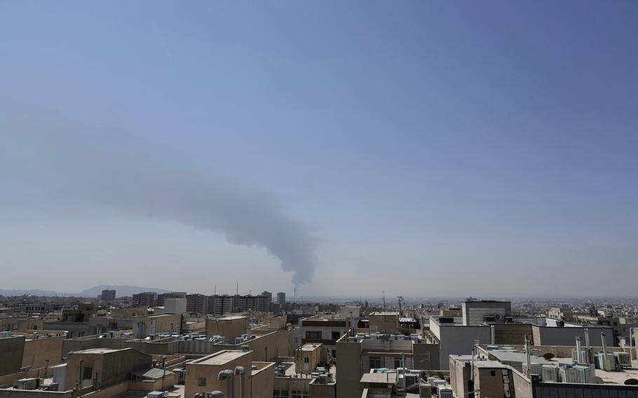 Smoke in the air in what otherwise is blue sky over Tehran.