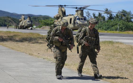 U.S. soldiers disembark inside the Naval Base Camilo Osias in Santa Ana, Cagayan province, northern Philippines after participating in joint military exercises on May 6, 2024.