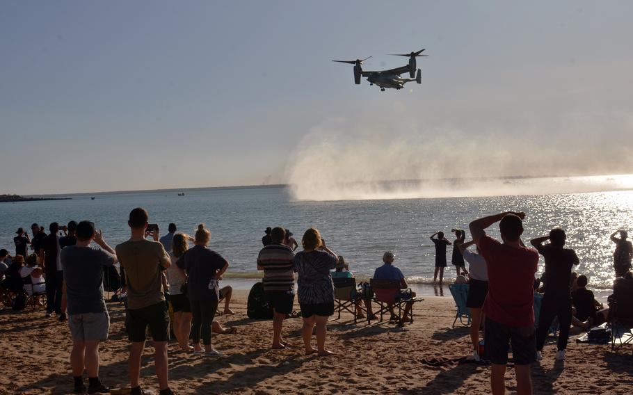 A Marine Corps MV-22 Osprey tilt-rotor aircraft hovers near Mindil Beachduring an airshow in Darwin, Australia, Thursday, Aug. 25, 2022. 
