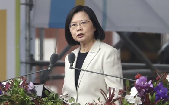 FILE - Taiwanese President Tsai Ing-wen delivers a speech during National Day celebrations in front of the Presidential Building in Taipei, Taiwan, Monday, Oct. 10, 2022. Tsai recently told Pope Francis in a letter that war with China is “not an option” and said constructive interaction with Beijing, which claims the island as part of its territory, depends on respecting self-ruled Taiwan's democracy.(AP Photo/Chiang Ying-ying, File)