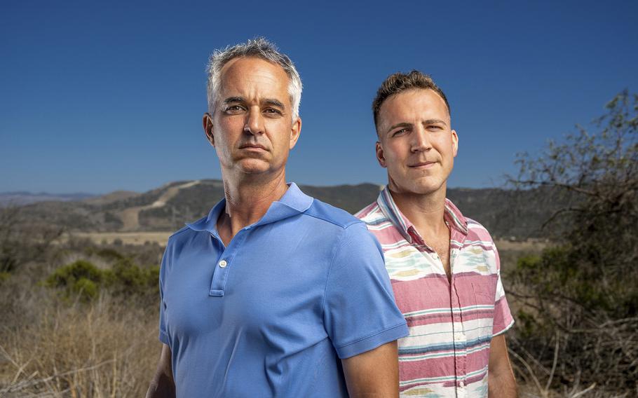 Retired Marine Lt. Col. Jamey Federico, left, and Marine Maj. Thomas Schueman are seen outside Camp Pendleton in San Clemente on Aug. 29, 2022. Both Marines went through extraordinary measures using their network of contacts to get their interpreters and their families out of Afghanistan. 