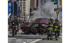 First-responders rush into the scene where motorist Richard Rojas drove his car onto a crowded Times Square sidewalk and mowed down 23 passengers, including 18-year-old Michigan woman Alyssa Elsman, who died in front of her little sister along 7th Avenue in New York, May 18, 2017.