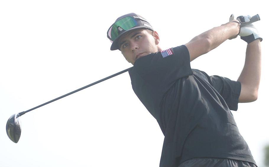 Kadena's Noah Williams, who finished sixth among the boys, tees off on the 530-yard, par-5 16th hole.