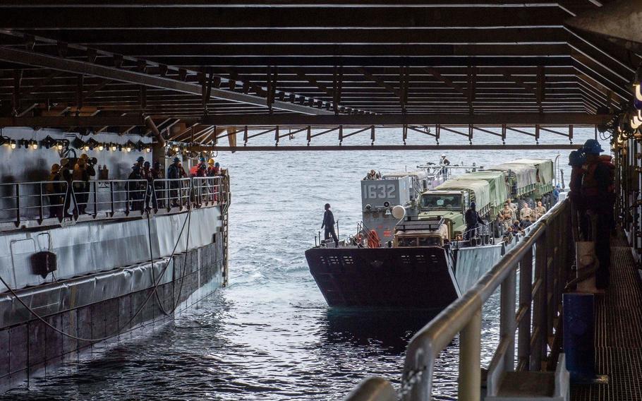 A landing craft, utility (LCU) assigned to Assault Craft Unit (ACU) 1 enters the well deck of dock landing ship USS Harpers Ferry (LSD 49) during exercise Steel Knight, Dec. 2, 2022. 