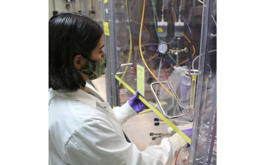 Lt. Maria Greenwood, research psychologist assigned to Naval Medical Research Unit Dayton,  investigates occupational health hazards at Wright-Patterson Air Force Base, Ohio, on Dec. 15, 2020.