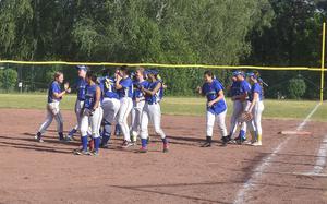 The Sigonella Jaguars celebrate after defeating Rota 8-5 on Friday, May 20, 2022, at Ramstein Air Base to stay alive in the DODEA-Europe Division II/III softball elimination tournament. Sigonella plays Spangdahlem on Saturday morning for the right to take on Naples for the championship.