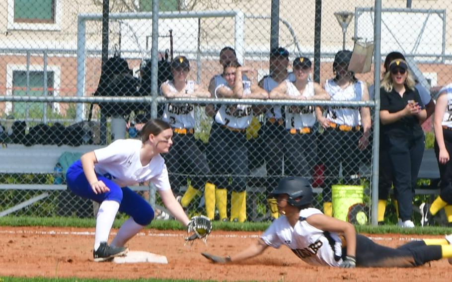 Addison Kryger of the Rota Admirals moves to tag out Nala Herron of the Vicenza Cougars as she tried to return to the base during the first of two games between the teams on Caserma Del Din, Vicenza, Italy April 6, 2024. 