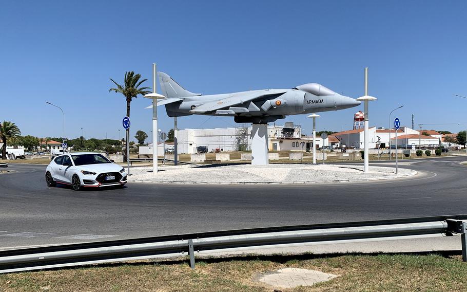 A car travels in a roundabout.