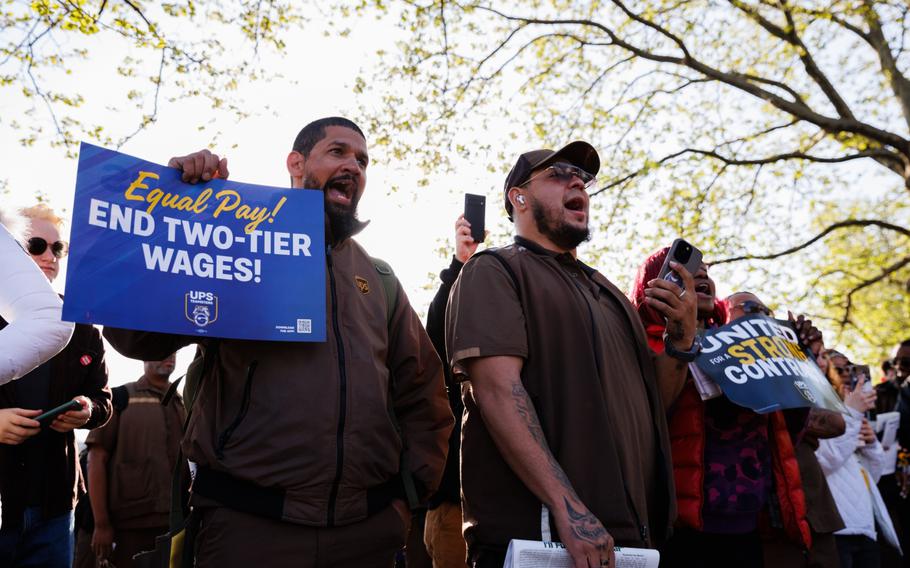 UPS workers and Teamsters members during a rally outside a UPS hub in Brooklyn, N.Y., in April. The shipping company’s labor contract is set to expire in August, and the company will face the first strike in 25 years if the two sides do not agree before then.