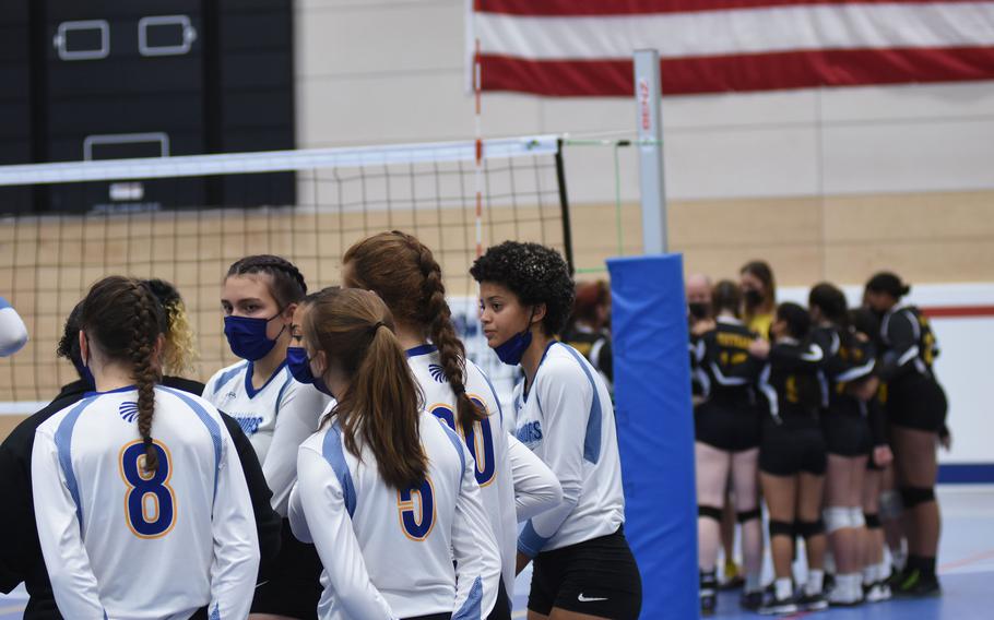 Wiesbaden and Stuttgart huddle up during the DODEA-Europe Division I girls’ volleyball championships on Saturday, Oct. 30, 2021, at Ramstein High School in Germany. The Panthers beat Wiesbaden in five sets to win the championship.