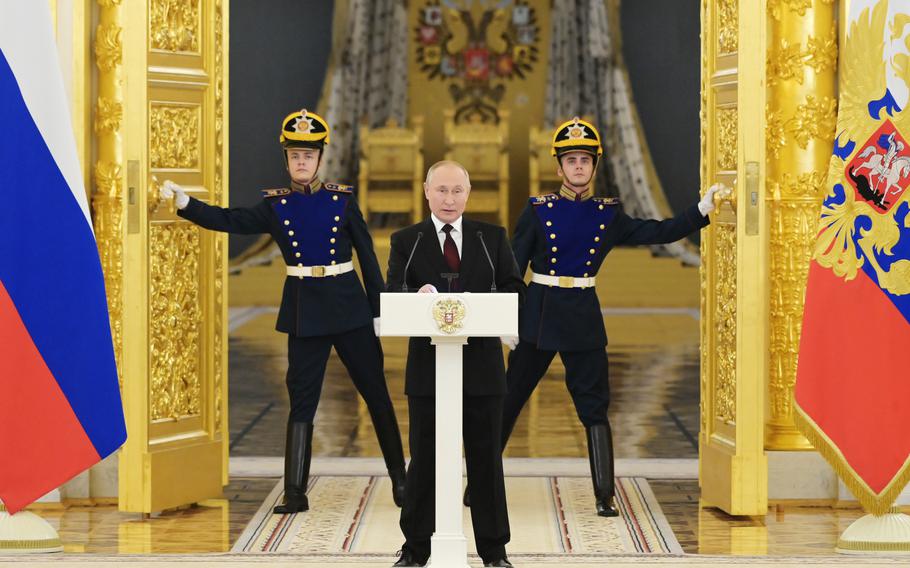 Russian President Vladimir Putin speaks during a ceremony to receive credentials from foreign ambassadors in Kremlin, in Moscow, Russia, Wednesday, Dec. 1, 2021. 