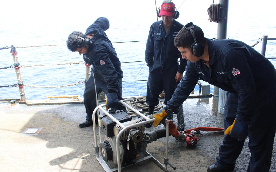 Sailors conduct rescue and assistance training