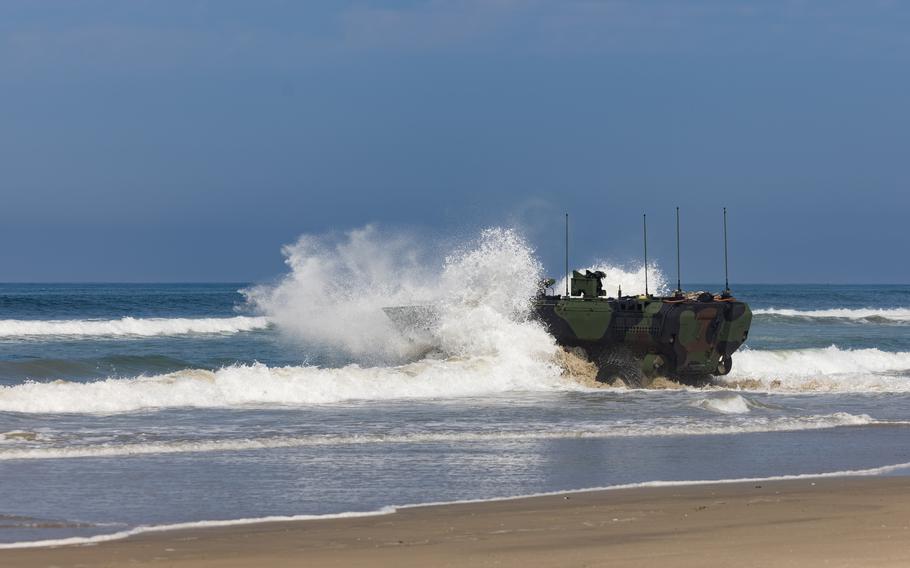 A U.S. Marine Corps Amphibious Combat Vehicle operated by Marines with the ACV Transition Training Unit enters the water at Marine Corps Base Camp Pendleton, Calif., June 21, 2023.
