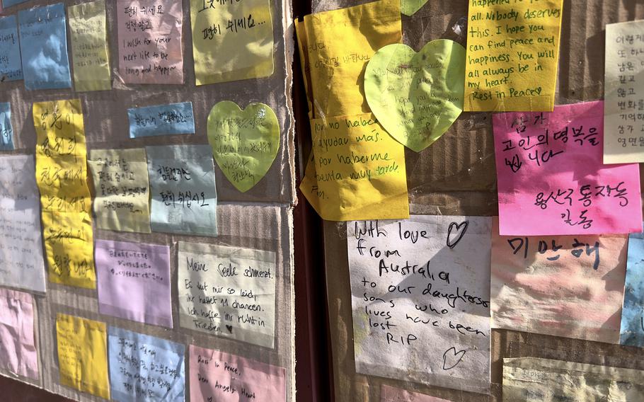 Colorful notes in an Itaewon alleyway pay tribute to victims of last month's crowd surge in Seoul, South Korea, Nov. 17, 2022.
