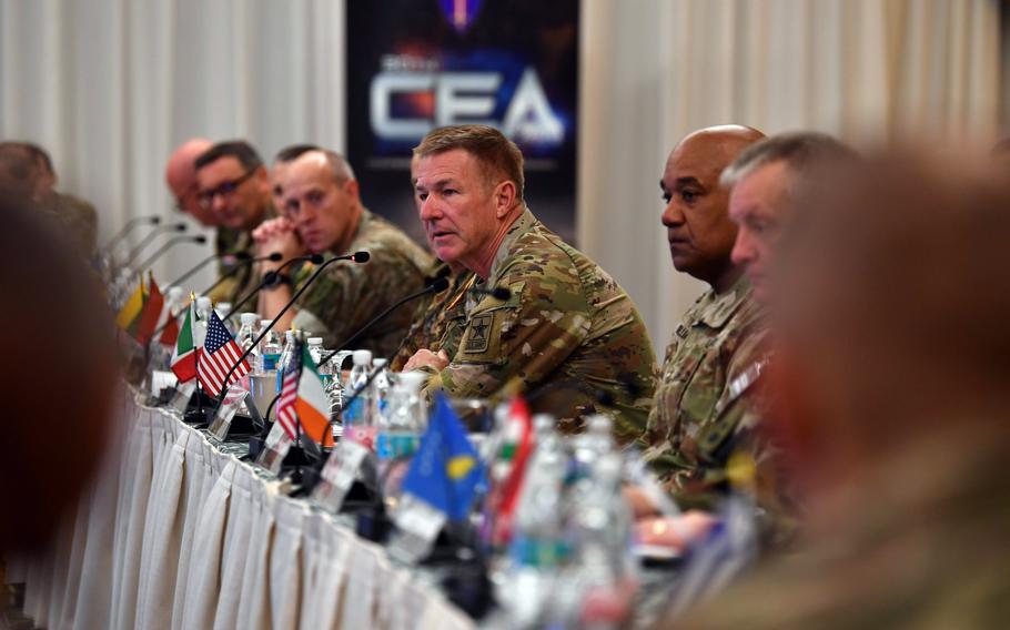 Army Chief of Staff Gen. James McConville, center, speaks during a meeting of ground force commanders in Europe, who were gathered this week for talks in Garmisch-Partenkirchen, Germany. On McConville's left is Gen. Darryl Williams, commander of U.S. Army Europe and Africa.