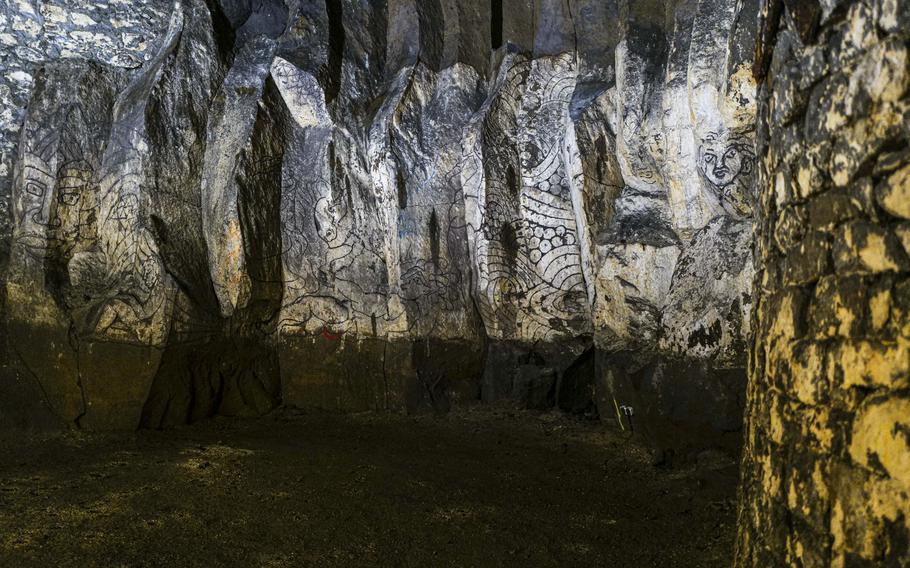 Wall paintings decorate one of the two underground wedding nooks in the lava caves in Mendig, Germany. This underground location is now a popular spot for couples seeking a distinctive wedding venue.