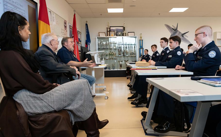 Retired Air Force Tech. Sgt. Dennis Walton, commander of the Veterans of Foreign Wars Post 10614, third from left, speaks with students at Kaiserslautern High School, Nov. 21, 2022. The Junior Reserve Officers’ Training Corps cadets donated $2,640 each to the local VFW and Fisher House branches. 
