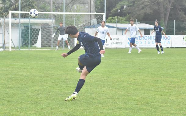 Aviano's Xavier Fox, who had a goal and two assists Saturday, takes a free kick that eventually sailed above to the right of the goal in the Saints' 3-2 victory over Rota on Saturday, April 27, 2024.

Kent Harris/Stars and Stripes