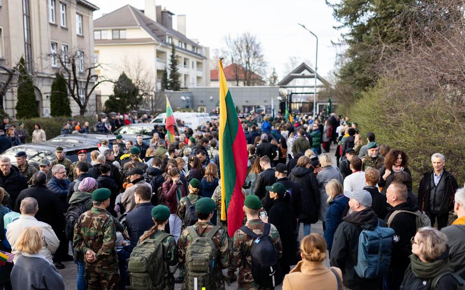 Scores of Lithuanians gather at the U.S. Embassy in Vilnius.